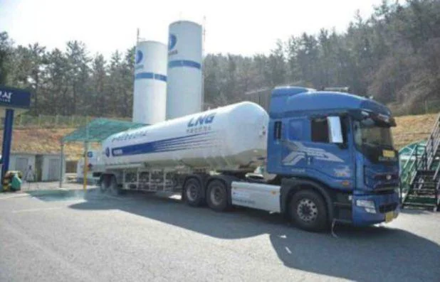 An LNG tanker at a gas-fueling station