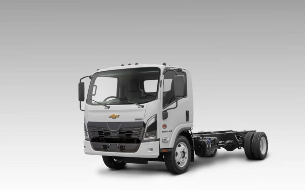 A light commercial cab and chassis shown on a white background