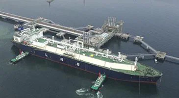 An aerial view of a vessel alongside a port terminal